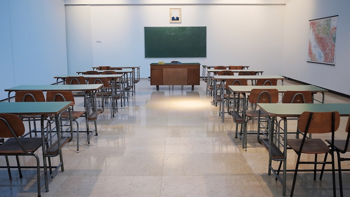 Bright modern classroom prepared for AI skills session